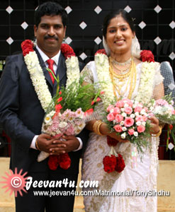 Tony Sindhu Wedding Pictures at St George Church Pala Kerala